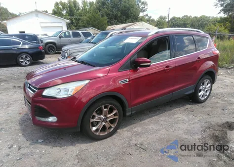 2015 Ford Escape Titanium z USA, uszkodzony, nr VIN 1FMCU0JX7FUC85628